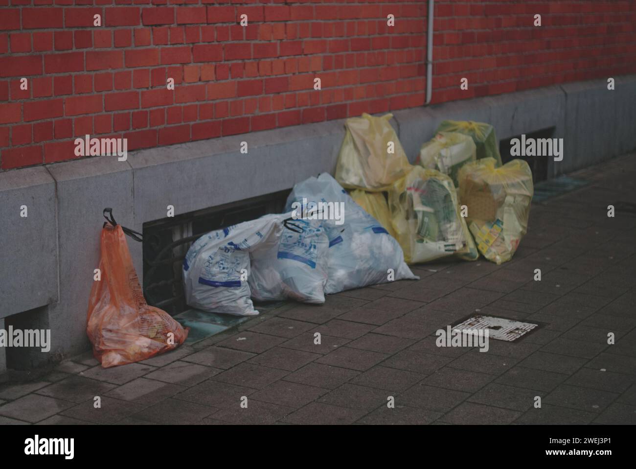 Garbage on the street in belgium hires stock photography and images