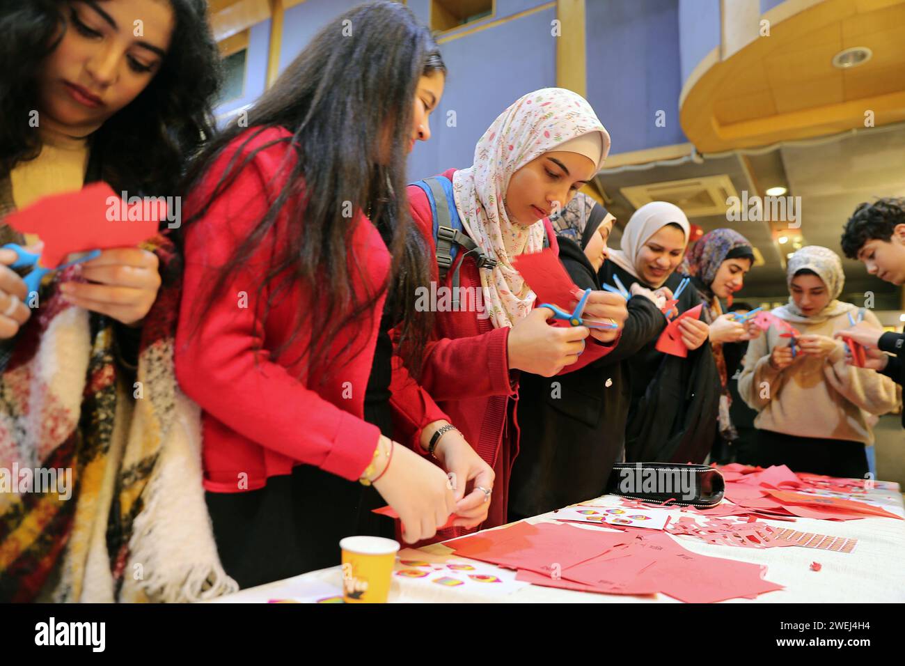 Cairo Egypt 25th Jan 2024 Egyptian Students Learn To Make Paper   Cairo Egypt 25th Jan 2024 Egyptian Students Learn To Make Paper Cutting Works During A Cultural Event For The Upcoming Chinese Spring Festival At The China Cultural Center In Cairo Egypt On Jan 25 2024 Credit Wang Dongzhenxinhuaalamy Live News 2WEJ4H4 