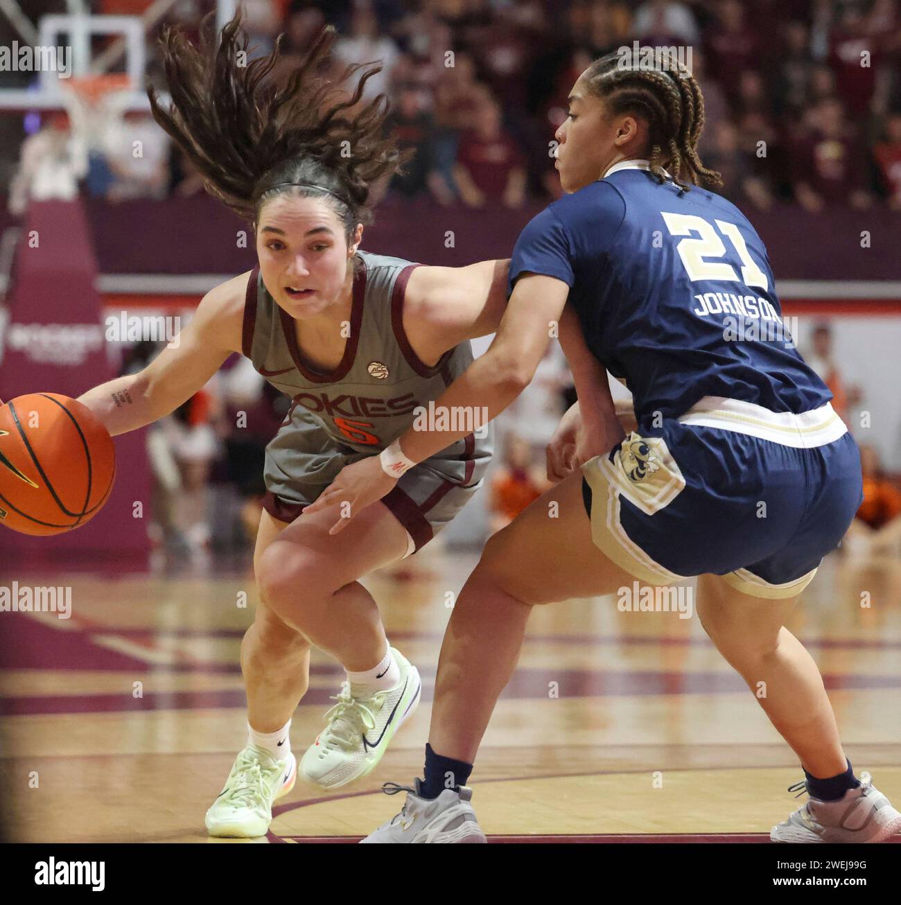 Virginia Tech's Georgia Amoore (5) drives against Georgia Tech's Sydney ...