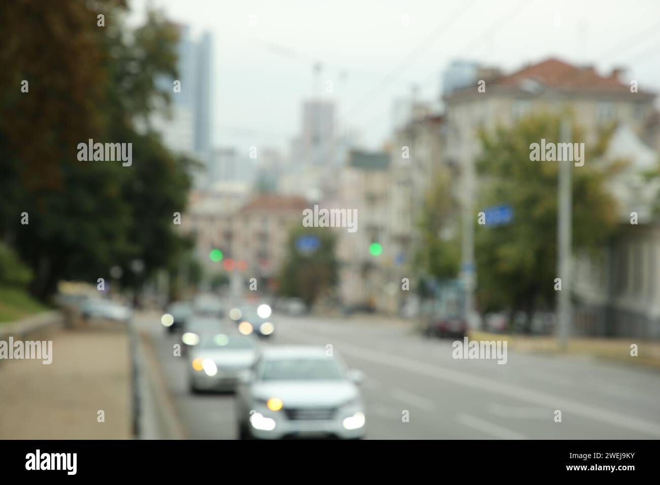 Defocused street scene sidewalk cars hi-res stock photography and ...