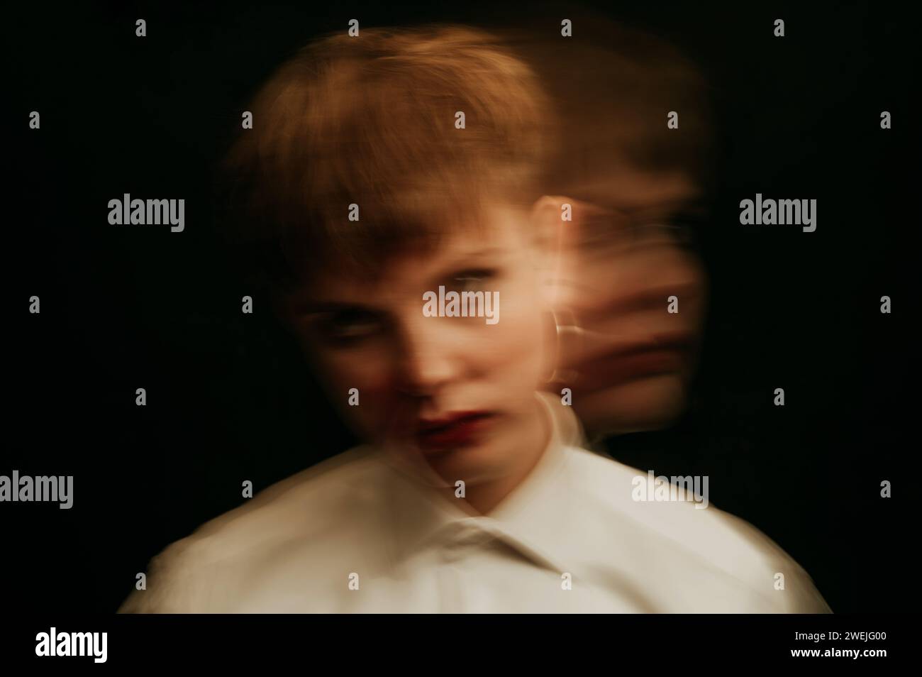 psychopath with mental disorders and insanity on a dark background. A ...