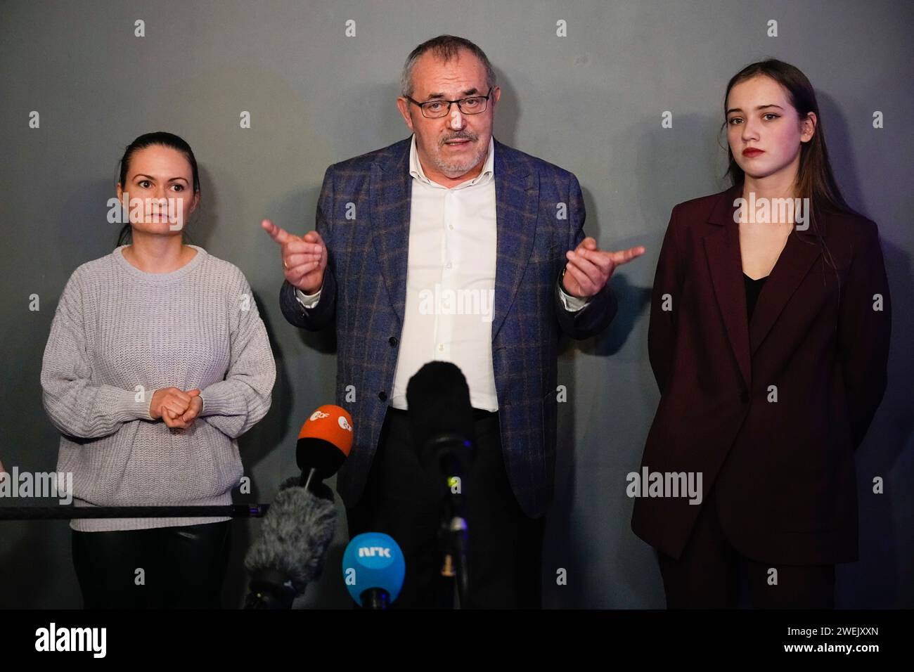 FILE - Boris Nadezhdin, center, a liberal Russian politician who is seeking to run for president in the March 17 election, meets in Moscow, Russia, on Thursday, Jan. 11, 2024, with soldiers' wives Maria Andreyeva, left, and Paulina, right, who did not give her last name. Nadezhdin, who opposes Moscow's military action in Ukraine, has met with women who demand that their husbands be discharged from military service. (AP Photo/Alexander Zemlianichenko, File) Stock Photo