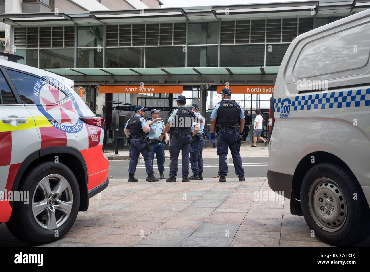 Sydney, Australia. 26th Jan, 2024. Police stand outside North Sydney station after a group of