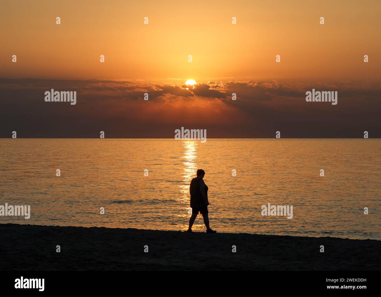 Sunrise over the Mediterranean Sea seen from the beach in Torremolinos. Costa del Sol, Spain Stock Photo