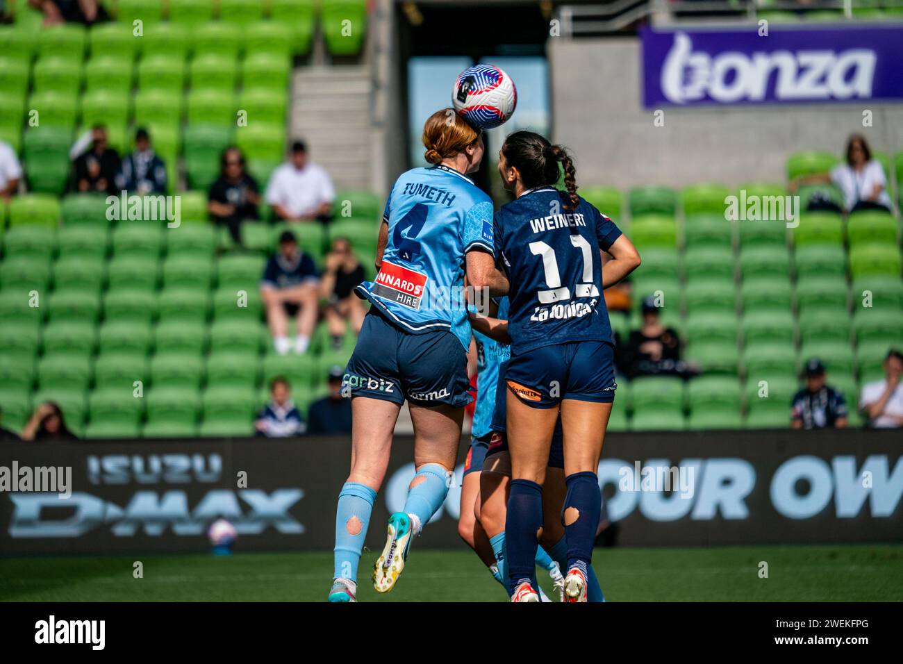 Melbourne, Australia. 26 January, 2024. Left to Right: Sydney FC Defender Tori Tumeth (#4) and Melbourne Victory FC Forward McKenzie Weinert (#11) compete for a header in the box during the Liberty A-League Women’s match between Melbourne Victory FC and Sydney FC at AAMI Park in Melbourne, Australia. Credit: James Forrester/Alamy Live News Stock Photo