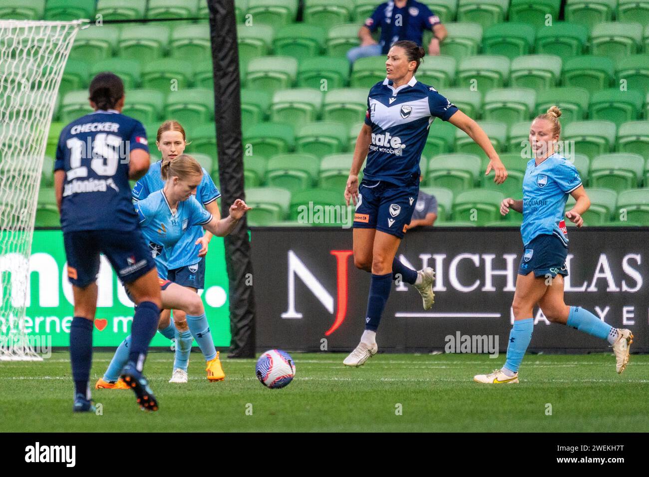 Melbourne, Australia. 26 January, 2024. Melbourne Victory FC Forward Emily Gielnik (#9) cops a boot to the foot and hops in pain during the Liberty A-League Women’s match between Melbourne Victory FC and Sydney FC at AAMI Park in Melbourne, Australia. Credit: James Forrester/Alamy Live News Stock Photo