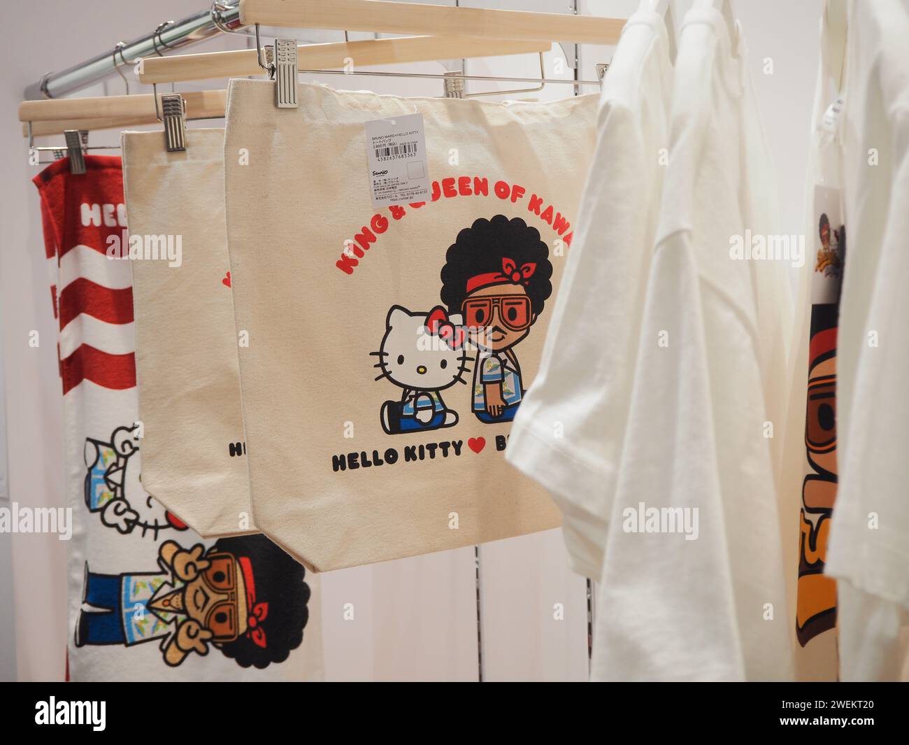 TOKYO, JAPAN - January 26, 2024: T-shirts and bags on display in a Hello Kitty x Bruno Mars pop-up store. It's in Tokyo's Shibuya area. Stock Photo