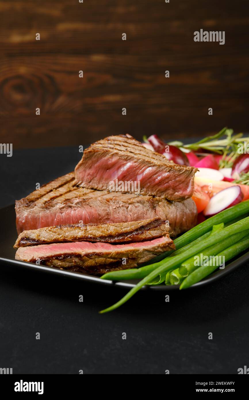 Grilled coulotte roast beef steak on dark background Stock Photo Alamy