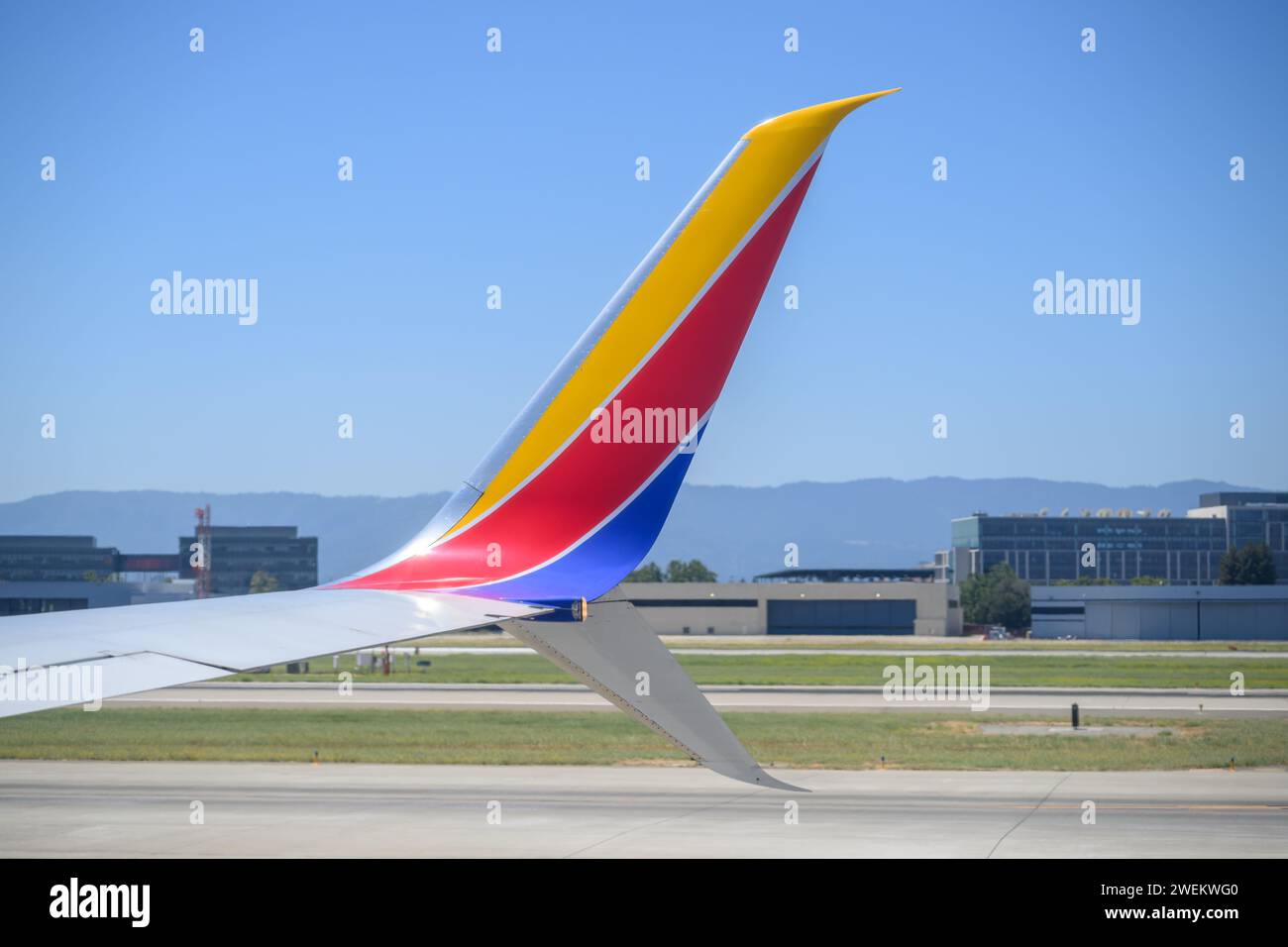 San Jose, USA - Jul 30 2023: Aircraft wing of Southwest Airlines at San Jose Mineta international Airport. Stock Photo