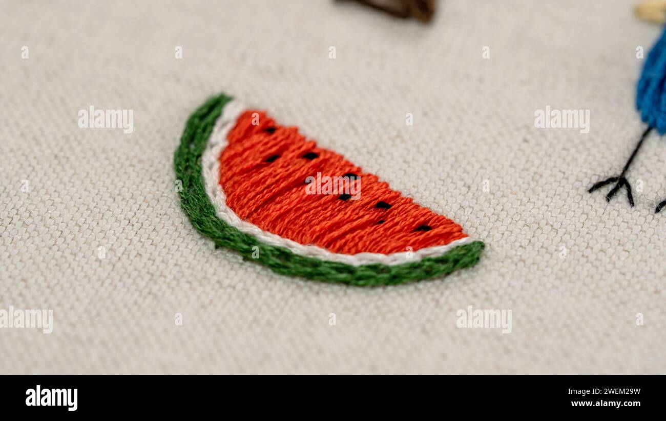 Summer Delight: Hand-Crafted Embroidered Slice of Watermelon on Cotton Stock Photo