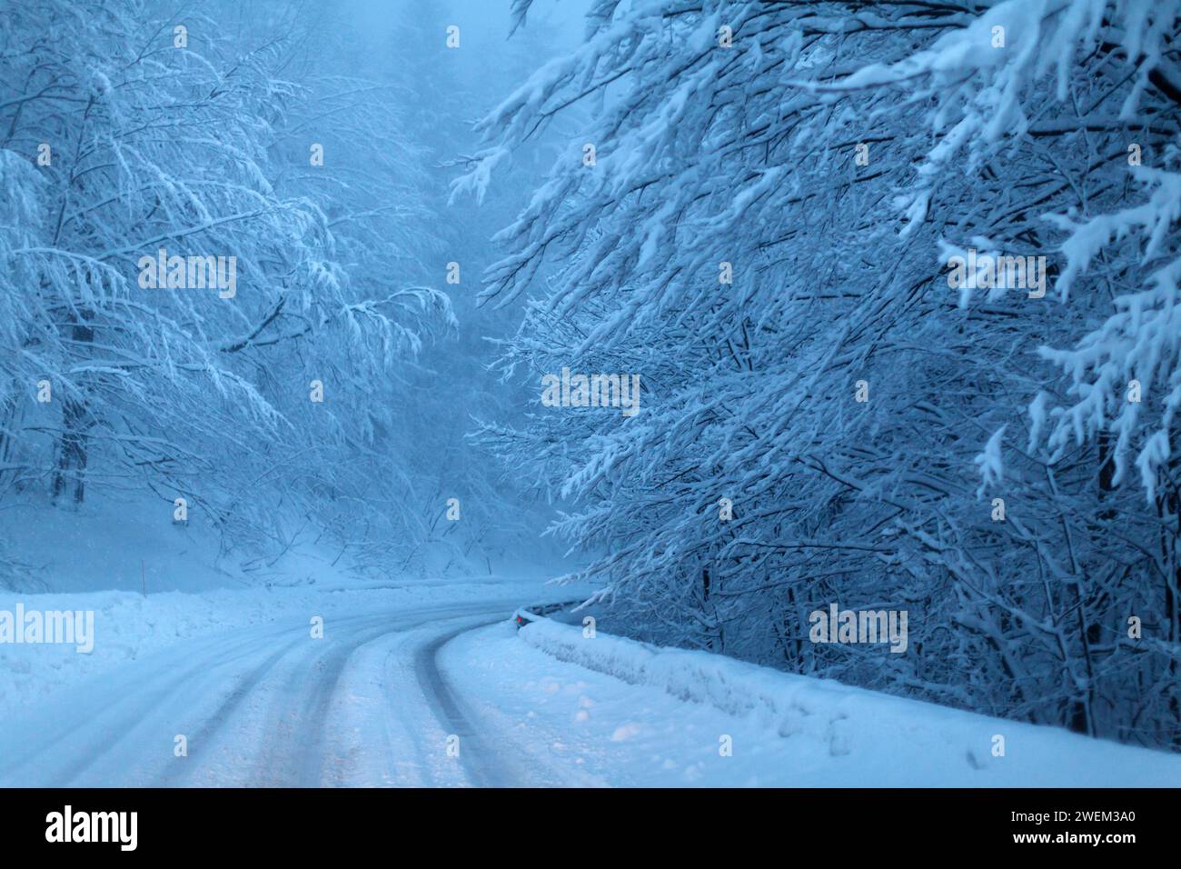 Winter Road Drive in Difficult Conditions Stock Photo