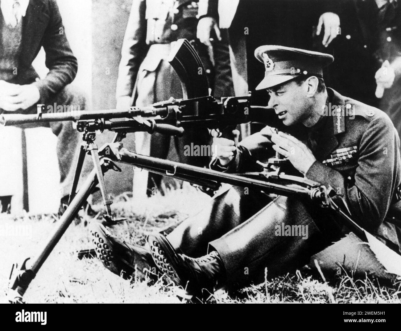 King George VI firing a Bren Light Machine Gun at the Royal Small Arms Factory Stock Photo