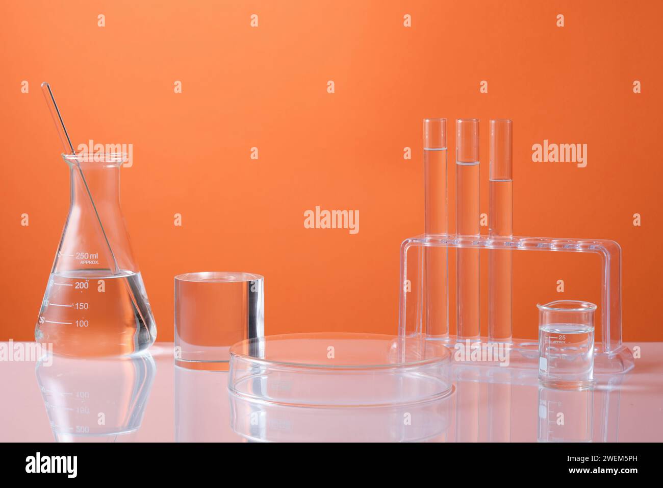 Front view of laboratory equipment erlenmeyer flask, test tubes and