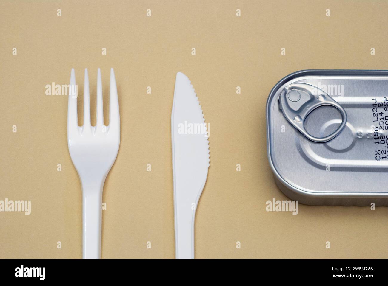 plastic cutlery and tin can Stock Photo