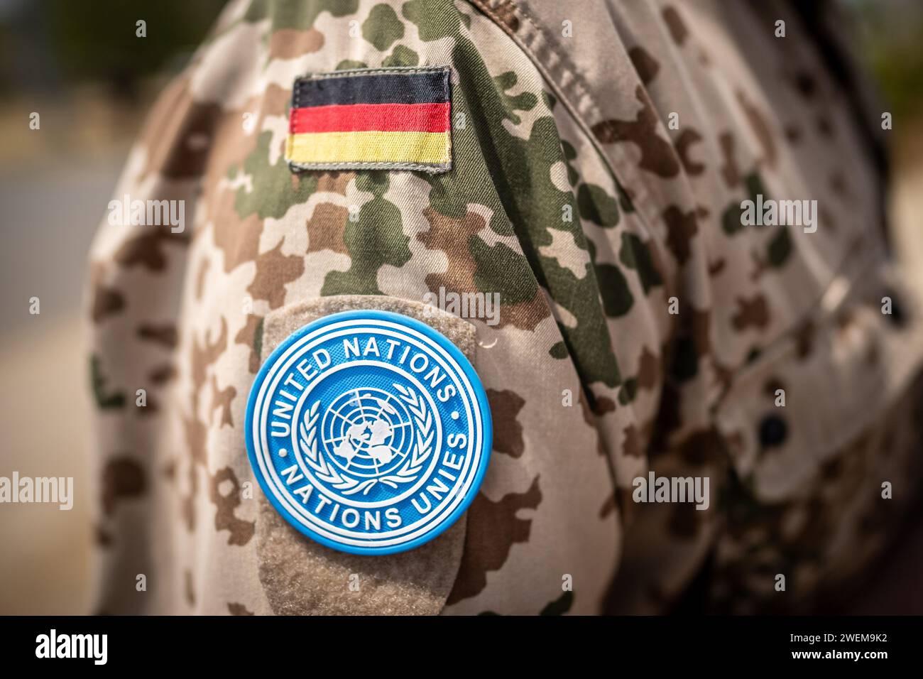 Juba, South Sudan. 26th Jan, 2024. The UN patch on the shoulder of a Bundeswehr soldier from the United Nations Mission UNMISS. Against the backdrop of the current fighting in Sudan, Baerbock's talks will focus on the question of how to better coordinate international mediation initiatives and increase pressure on the parties to the conflict. Credit: Michael Kappeler/dpa/Alamy Live News Stock Photo