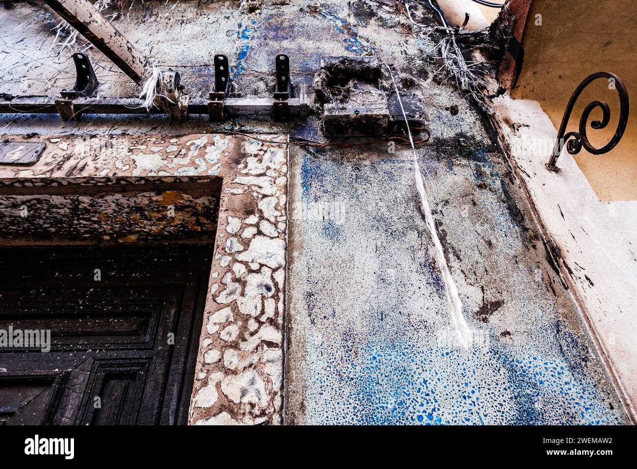 Facade and burned cables in the old town of Villajoyosa Stock Photo