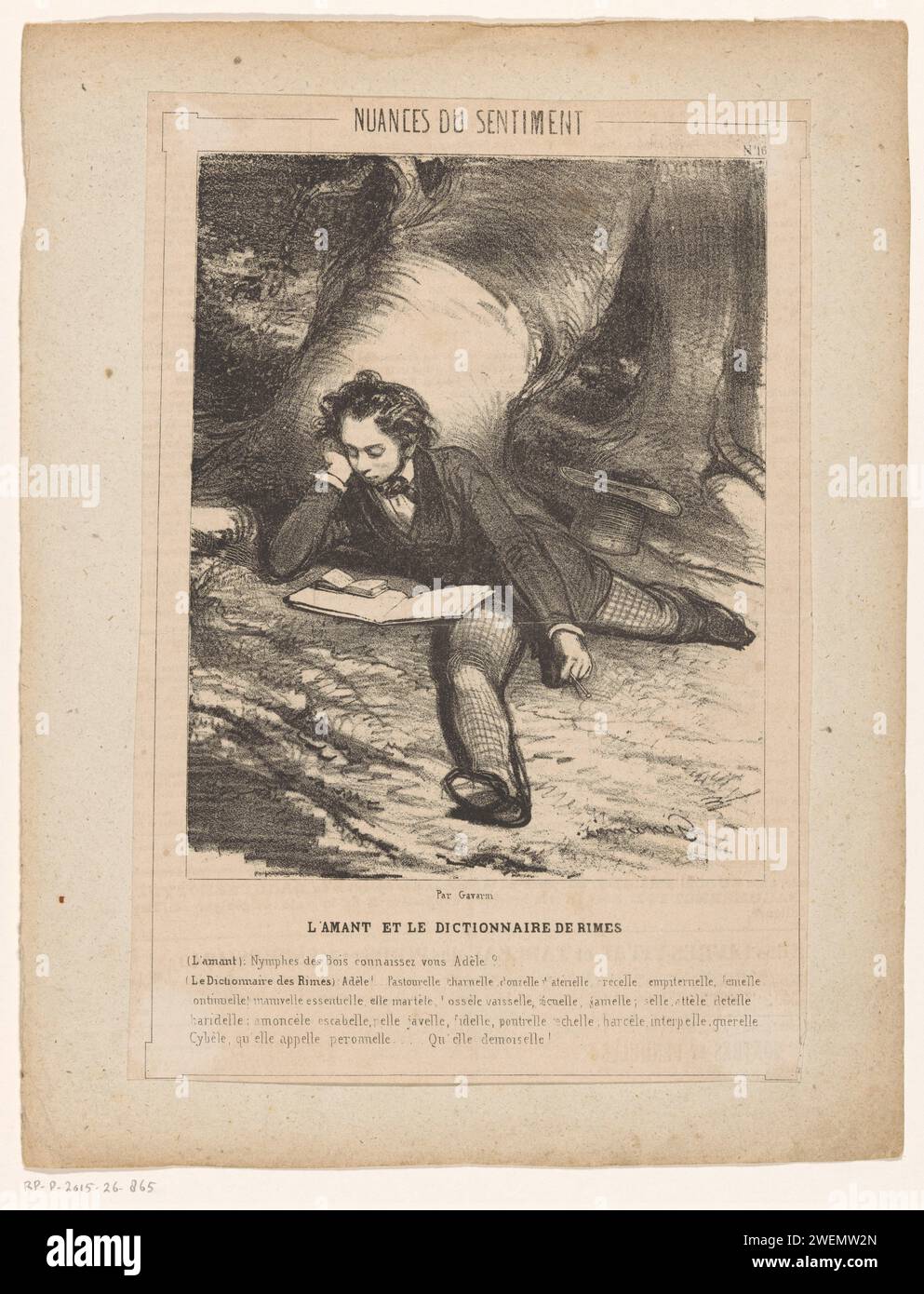 In love young man with a rhyme dictionary under the foot of a tree, in ...