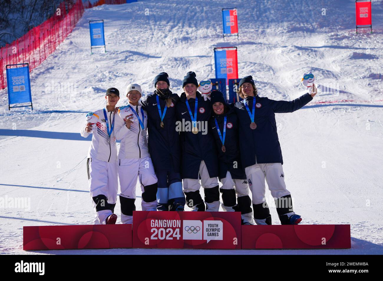 Jeongseon, South Korea. 26th Jan, 2024. Gold medalists Elizabeth Lemley(3rd L) and Porter Huff (3rd R) of the United States, silver medalists Yun Shin-Ee (1st L) and Lee Yoon Seung (2nd L) of South Korea and bronze medalists Abby McLarnon (2nd R) and Jiah Cohen of the United States pose on the podium during the victory ceremony for the Mixed Team Dual Moguls of Freestyle Skiing at the Gangwon 2024 Winter Youth Olympic Games in Jeongseon, South Korea, Jan. 26, 2024. Credit: Zhang Xiaoyu/Xinhua/Alamy Live News Stock Photo
