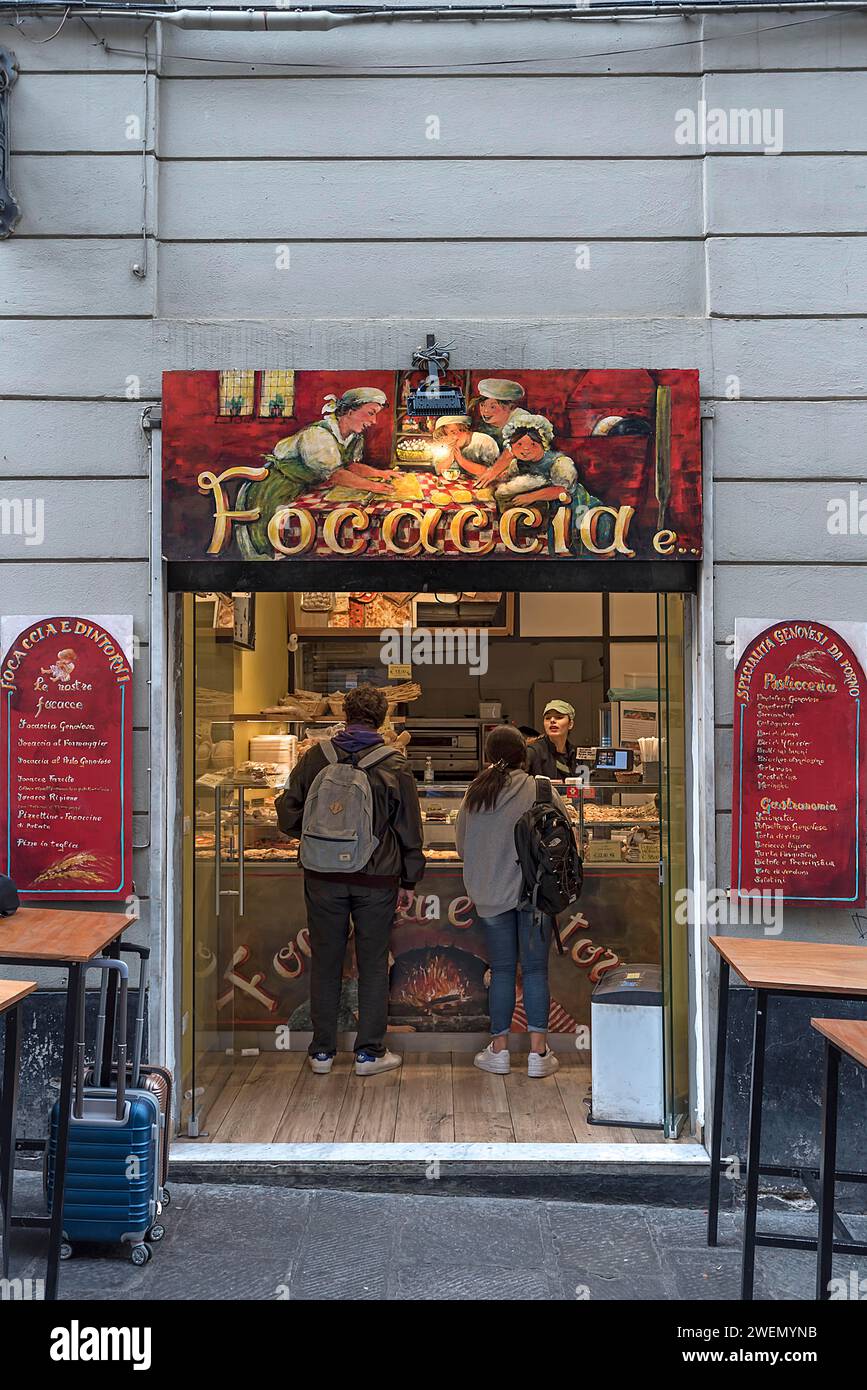 Small bakery with a painting of a baking scene above the shop in the historic centre, Via di Canneto Il Curto, 21, Old Town, Genoa, Italy Stock Photo