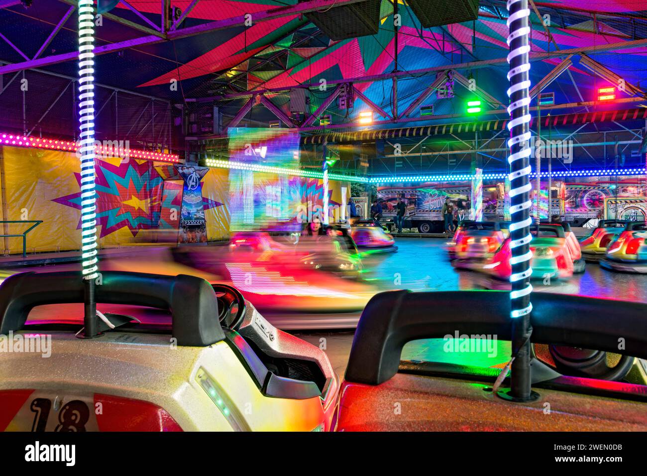 Autoscooter speedway, autodrome, bumper cars, electric cars with colourful lighting, fairground ride at Kalter Markt, Kaale Maeaert, funfair Stock Photo