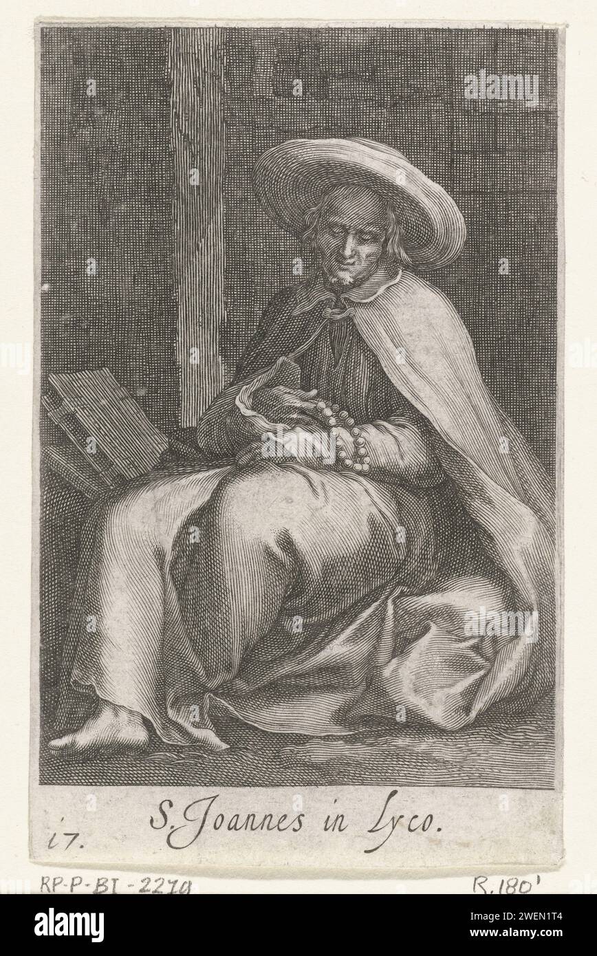 Saint John of Lycopolis as a recluse in his cell, Boëtius Adamsz. Bolswert, after Abraham Bloemaert, 1619 print   paper engraving saints. anchorite, hermit Stock Photo
