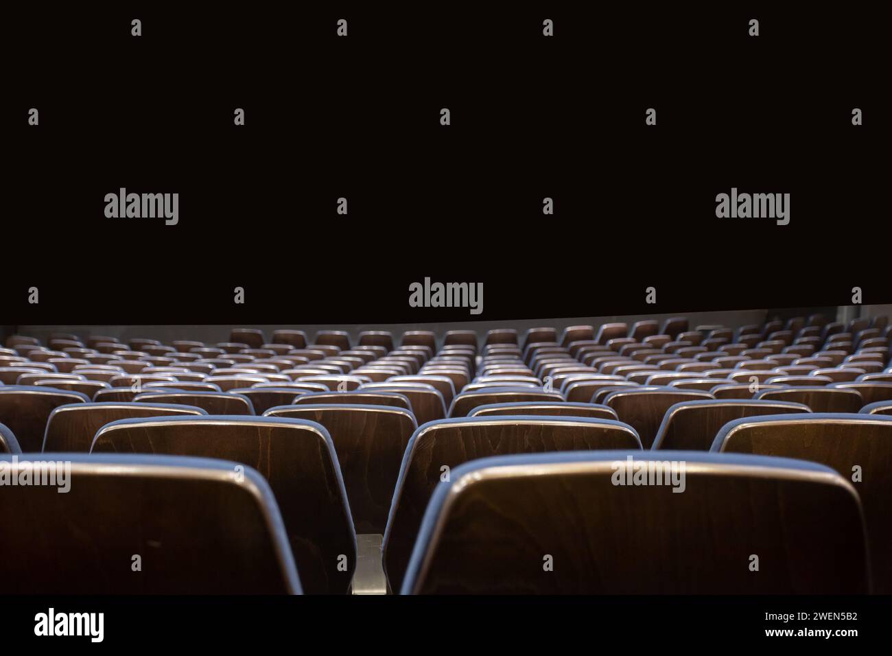 empty theater seats with dark background Stock Photo