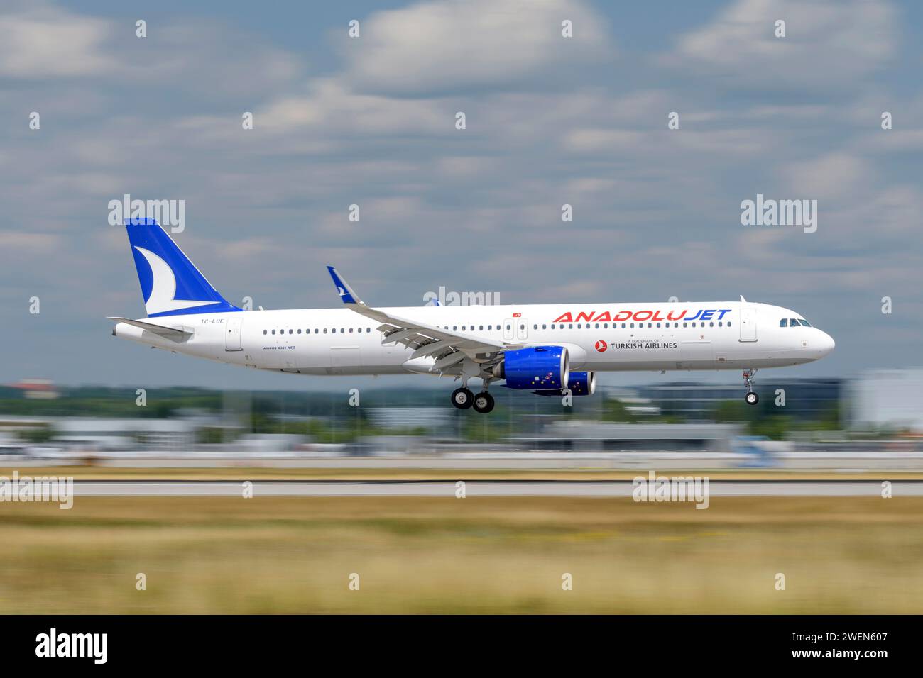Munich, Germany - July 06. 2023 : AnadoluJet Airbus A321-271NX with the aircraft registration TC-LUE during landing on the southern runway 08R of the Stock Photo