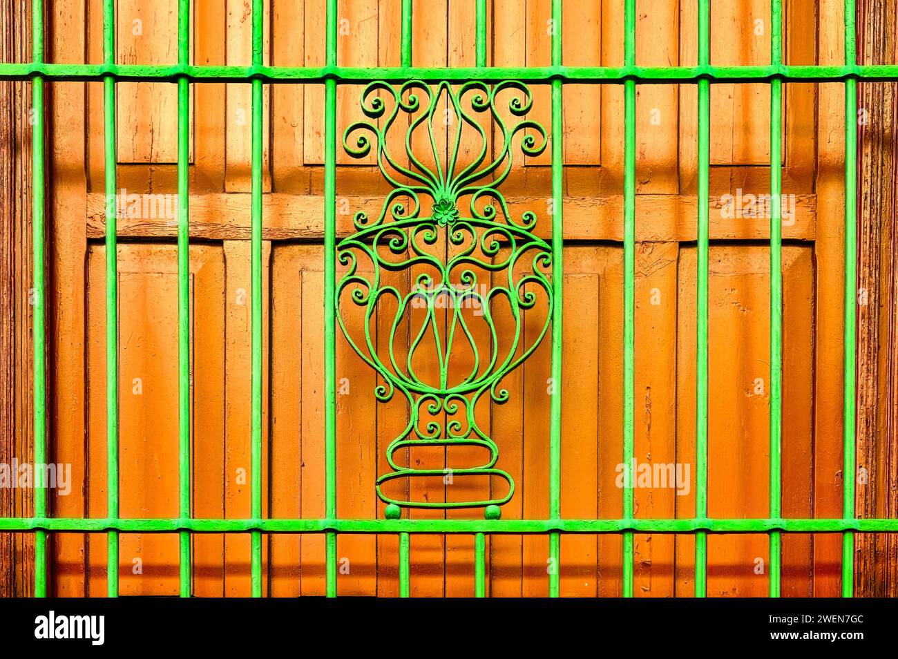 colonial metal grate in building window Stock Photo