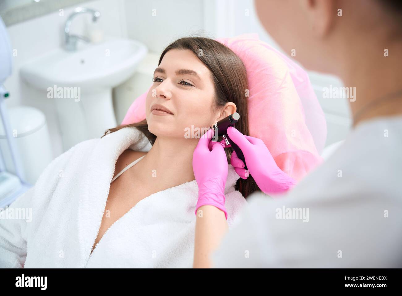 Body piercing procedure hi-res stock photography and images - Alamy