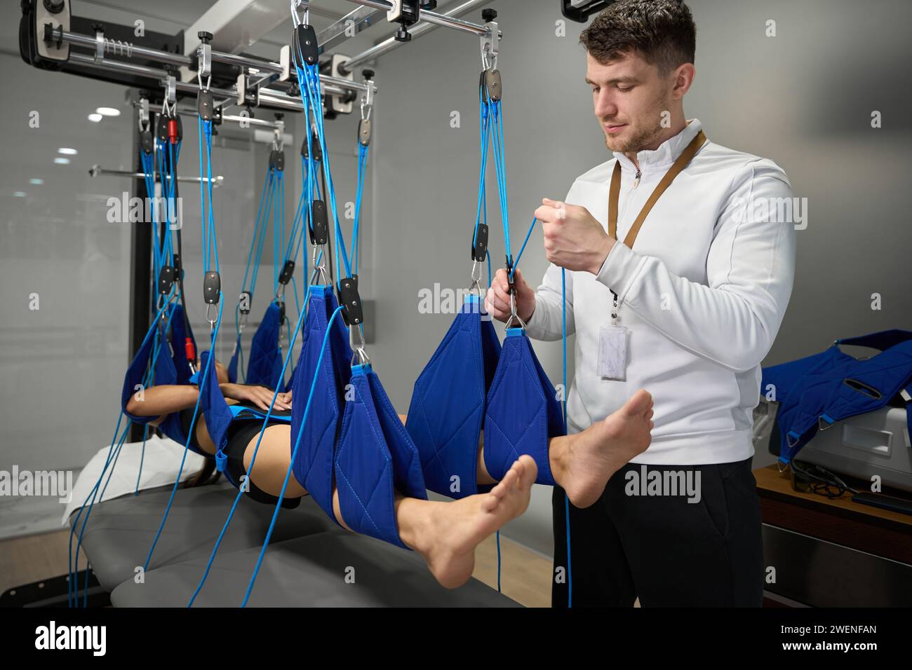 Suspension training physical therapy exercise hi-res stock