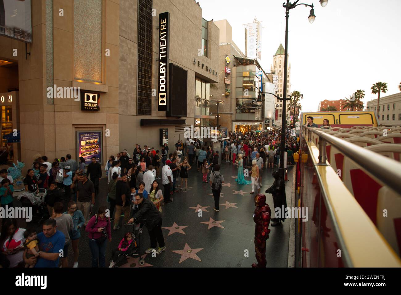 Crowds and entertainers dressed as movie characters outside the Dolby Theatre on Hollywood Boulevard in LA, California, USA. Stock Photo
