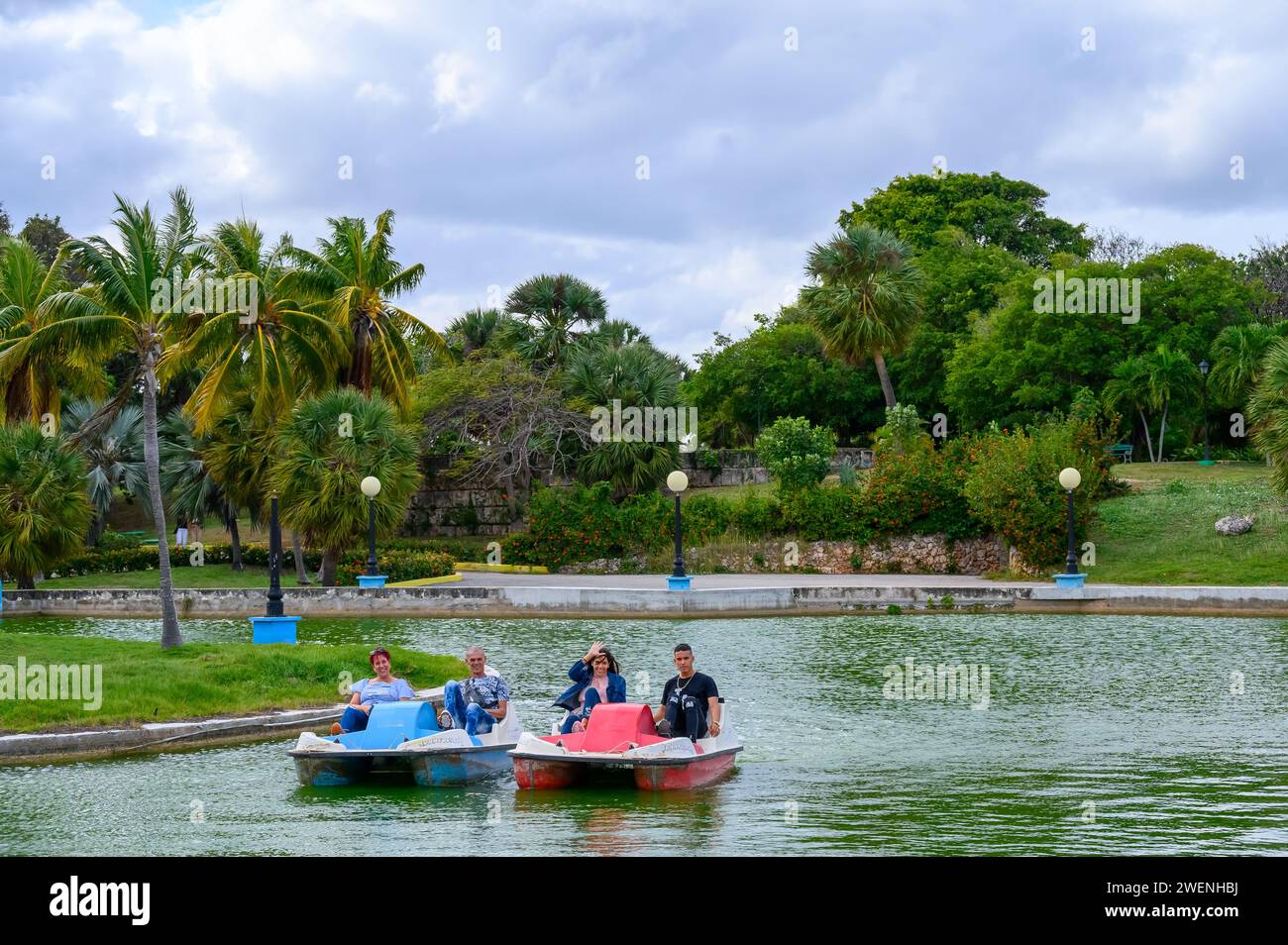 people in aquatic bicycle in parque josone, varadero, cuba Stock Photo