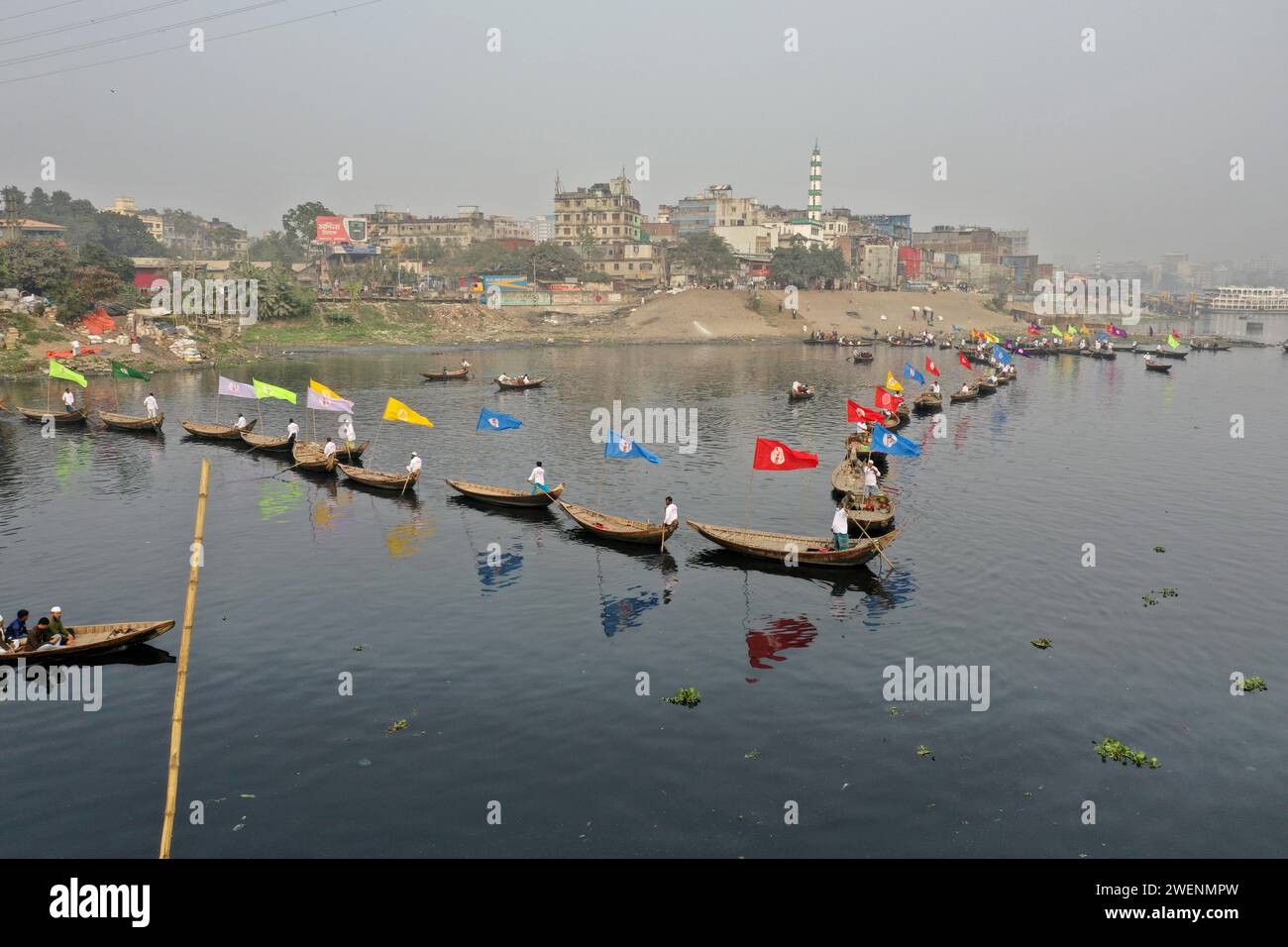 Dhaka, Bangladesh - January 26, 2024: In order to protect the original Buriganga River, 'Nongor' held a boat rally in the Buriganga River at Kamrangir Stock Photo