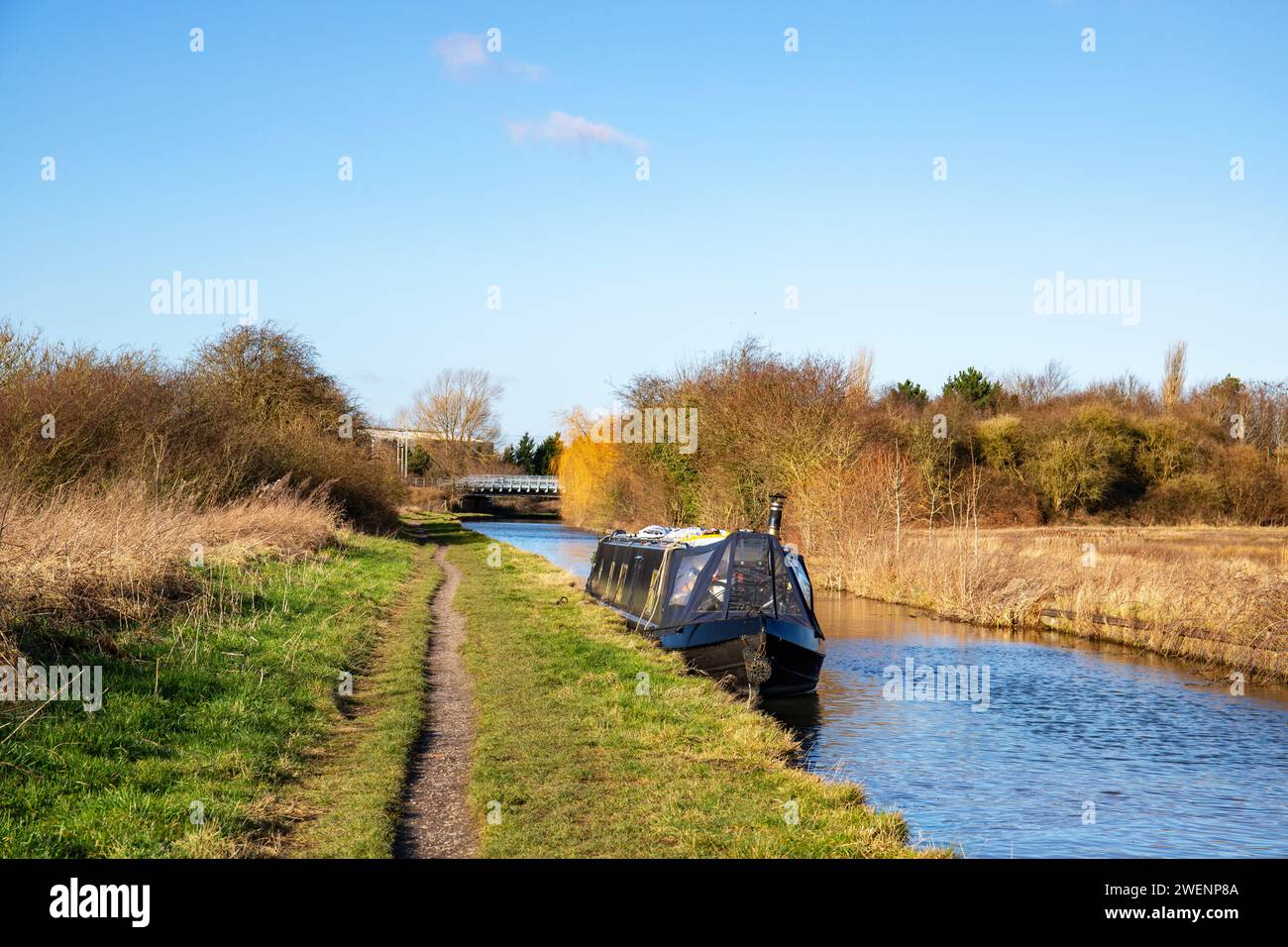 Moored narrow boat on the Trent & Mersey canal in Cheshire UK Stock Photo