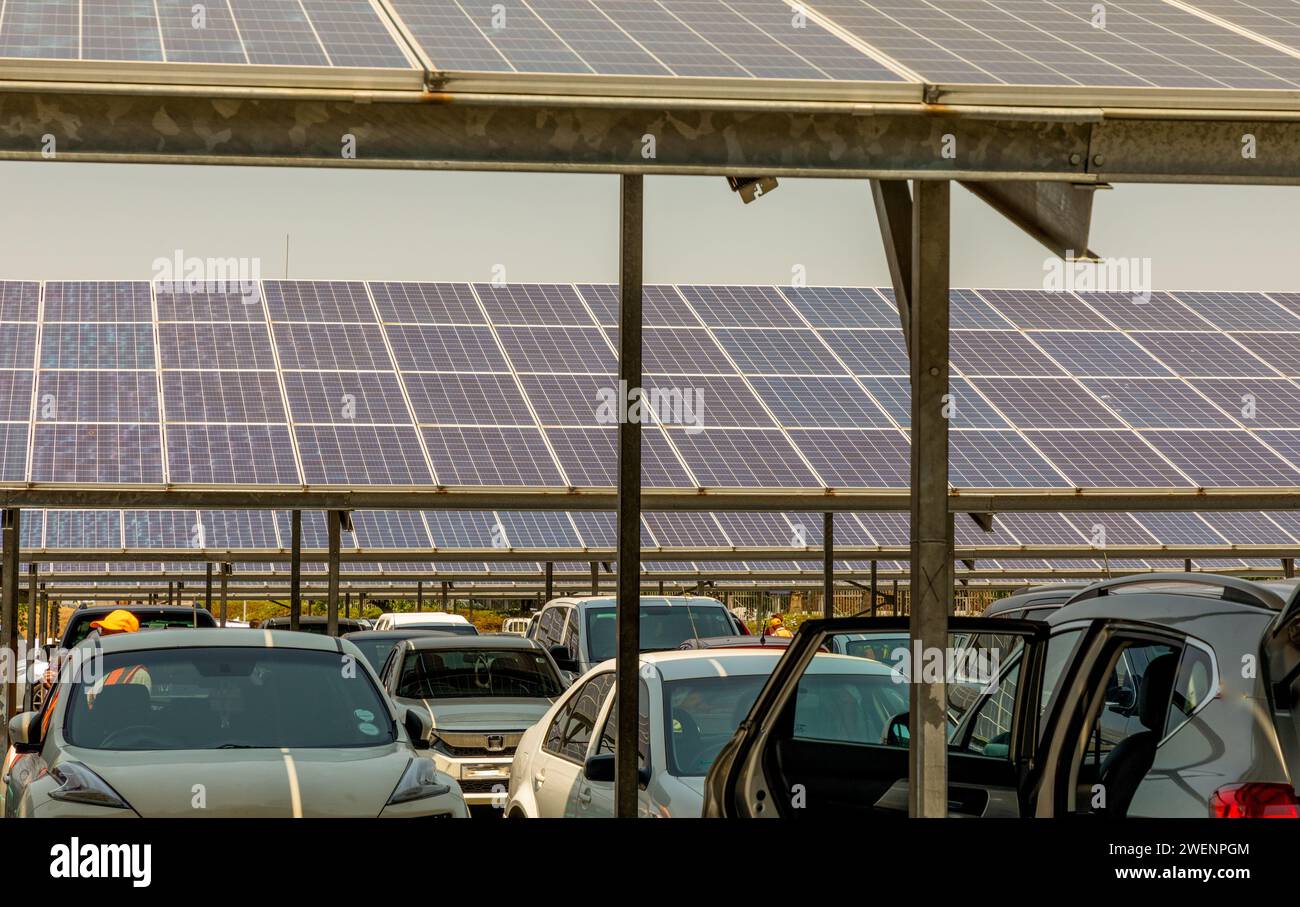 Solar panels are seen at a big-box store parking lot in northern Johannesburg, South Africa. The panels alleviate the problems of ongoing black-outs. Stock Photo