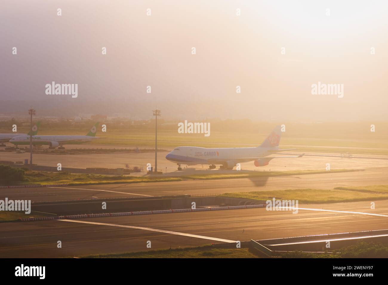 Taipei, Republic of China - October 2, 2023: A China Airlines Boeing 747 cargo plane aircraft parked by the runway at Taiwan Taoyuan International Air Stock Photo