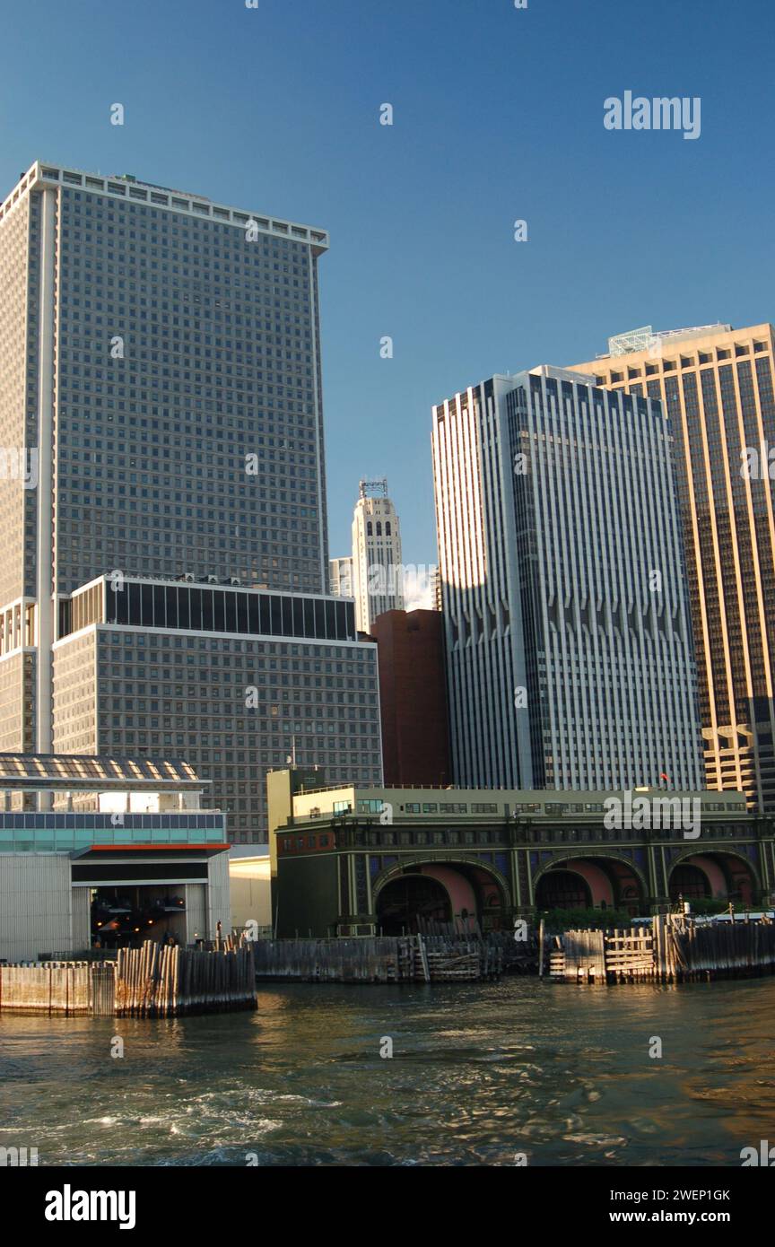 The skyscrapers of Lowe Manhattan rise over the waterfront as seen from