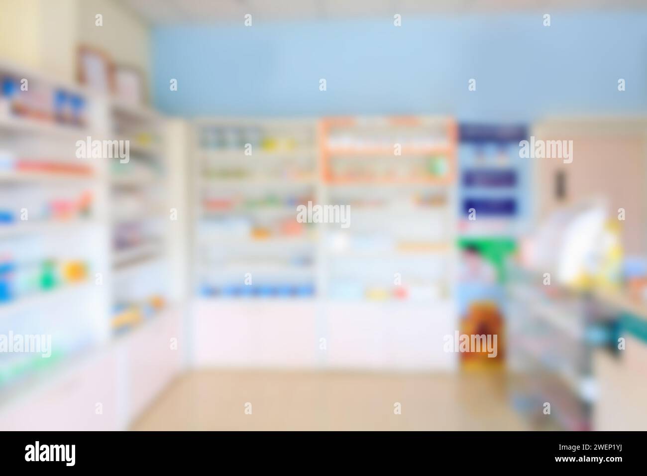 pharmacy shelves filled with medication blur background, drugstore ...