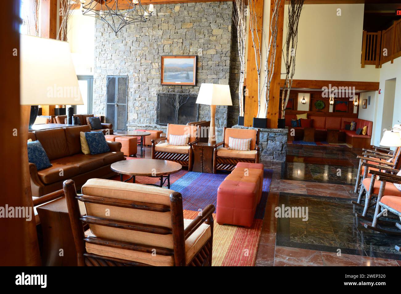 The rustic and chic lobby offers a relaxing location at the mountain resort in Stowe Vermont Stock Photo