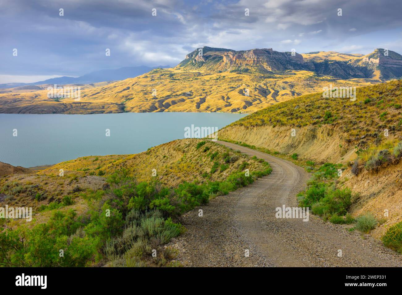 Cody, Wyoming, USA - View across the Shoshone river and reservoir flanked by the foothills of the Rockies on the horizon at sunrise in Cody, USA. Stock Photo