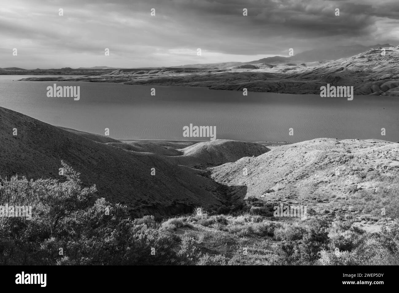 Cody, Wyoming, USA - View across the Shoshone river and reservoir flanked by the foothills of the Rockies on the horizon at sunrise in Cody, USA. Stock Photo