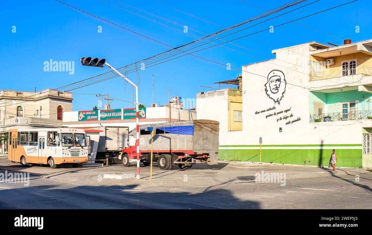 giron bus and vintage truck in the maceo y central gas station, santa