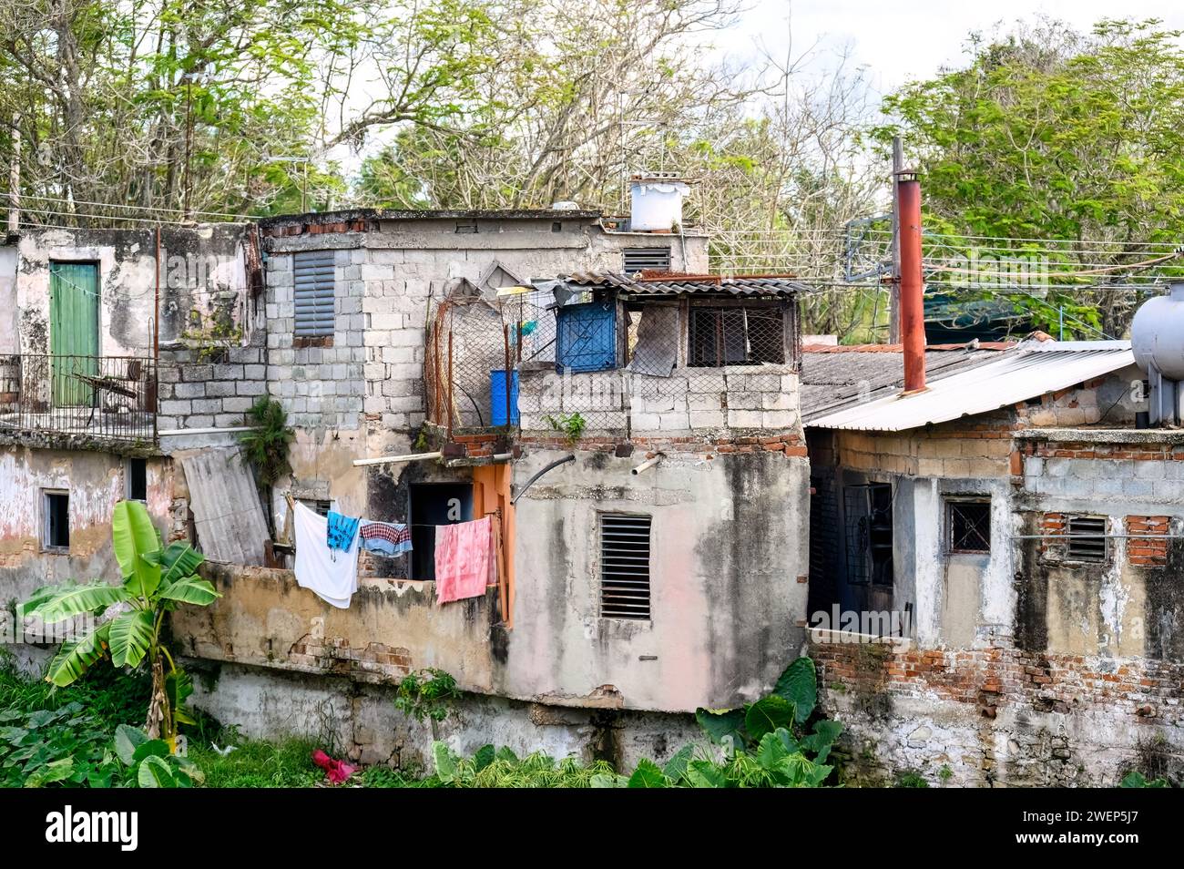 poverty houses by river in santa clara, cuba Stock Photo