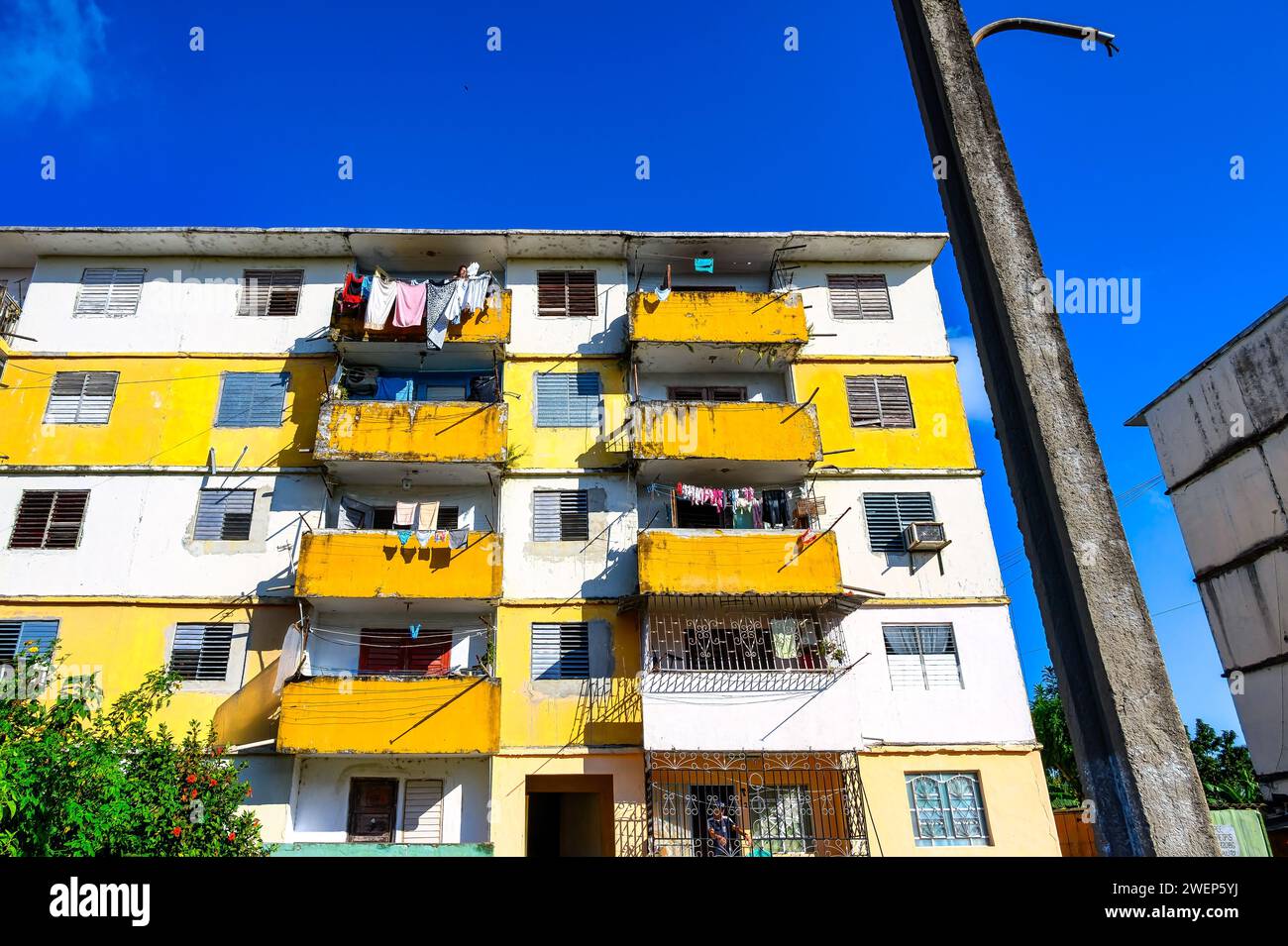 facade balcony clothesline in jose marti district, santa clara, cuba Stock Photo
