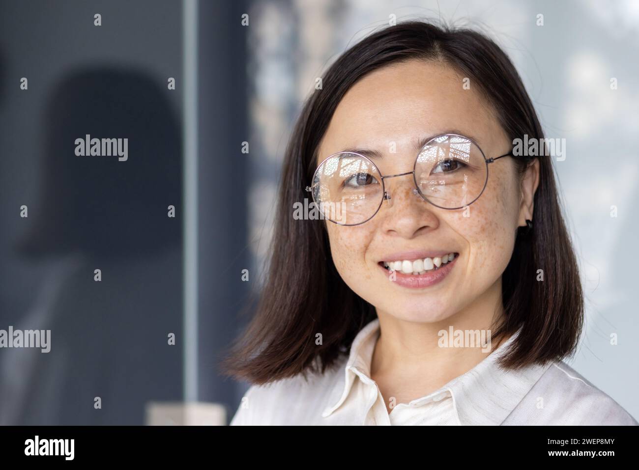 Positive asian young female hi-res stock photography and images - Alamy