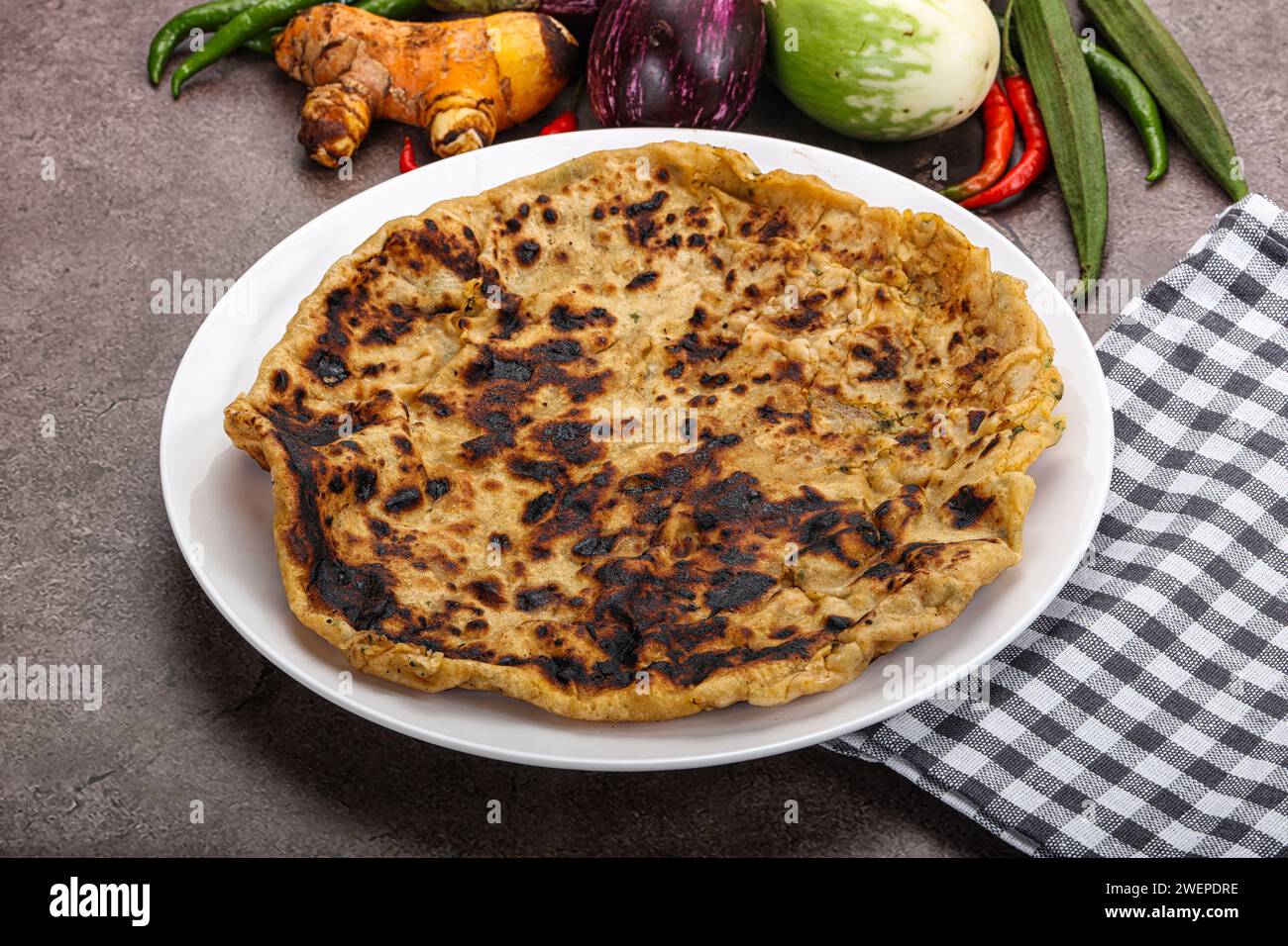 Indian cuisine stuffed Aloo paratha bread with potato Stock Photo Alamy