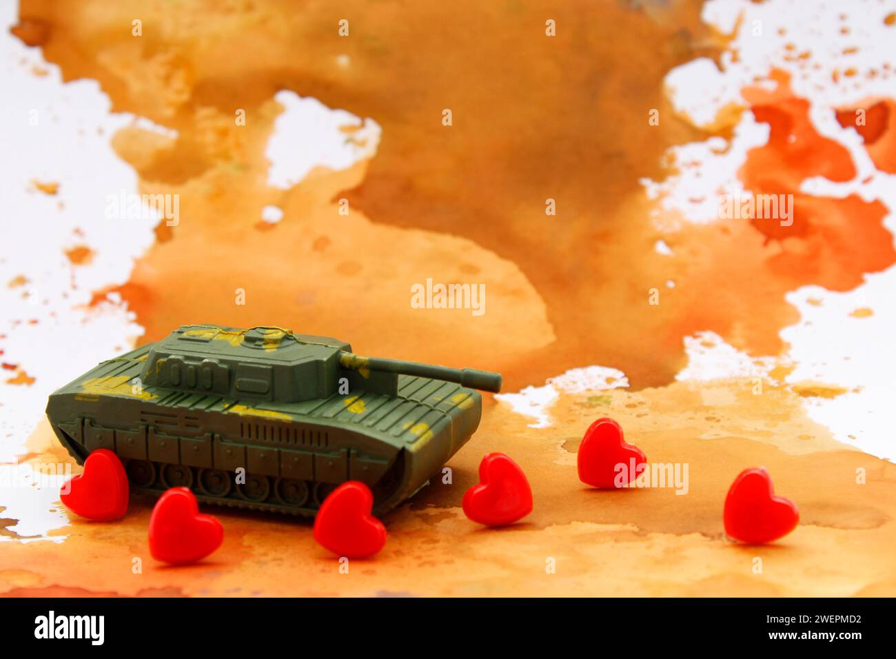Tank Breaking Red Ribbon Red hearts stopping a war tank Stock Photo - Alamy