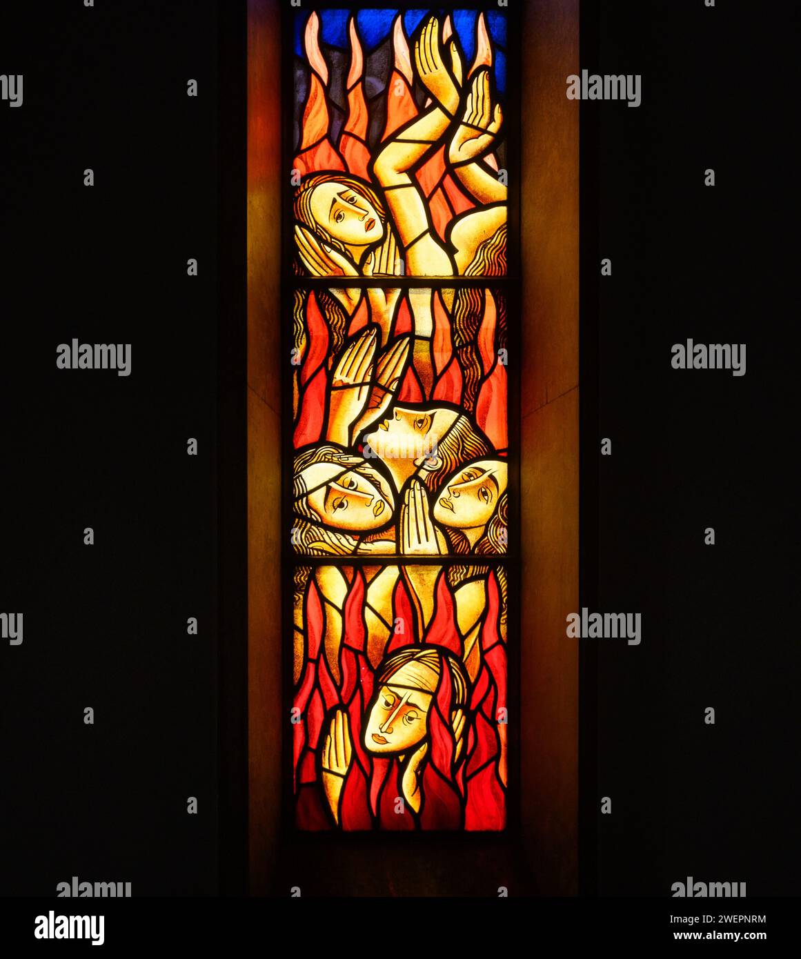 Souls in Purgatory. A part of a larger stained-glass window in Igreja de Nossa Senhora de Fátima, Lisbon. Stock Photo