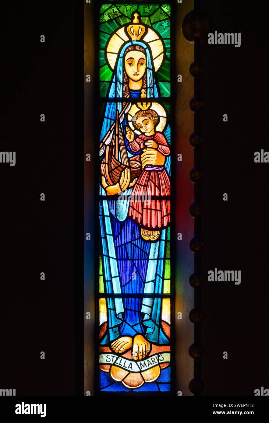 Stella Maris [Star of the Sea], a title of the Virgin Mary. A stained-glass window in Igreja de Nossa Senhora de Fátima, Lisbon. Stock Photo