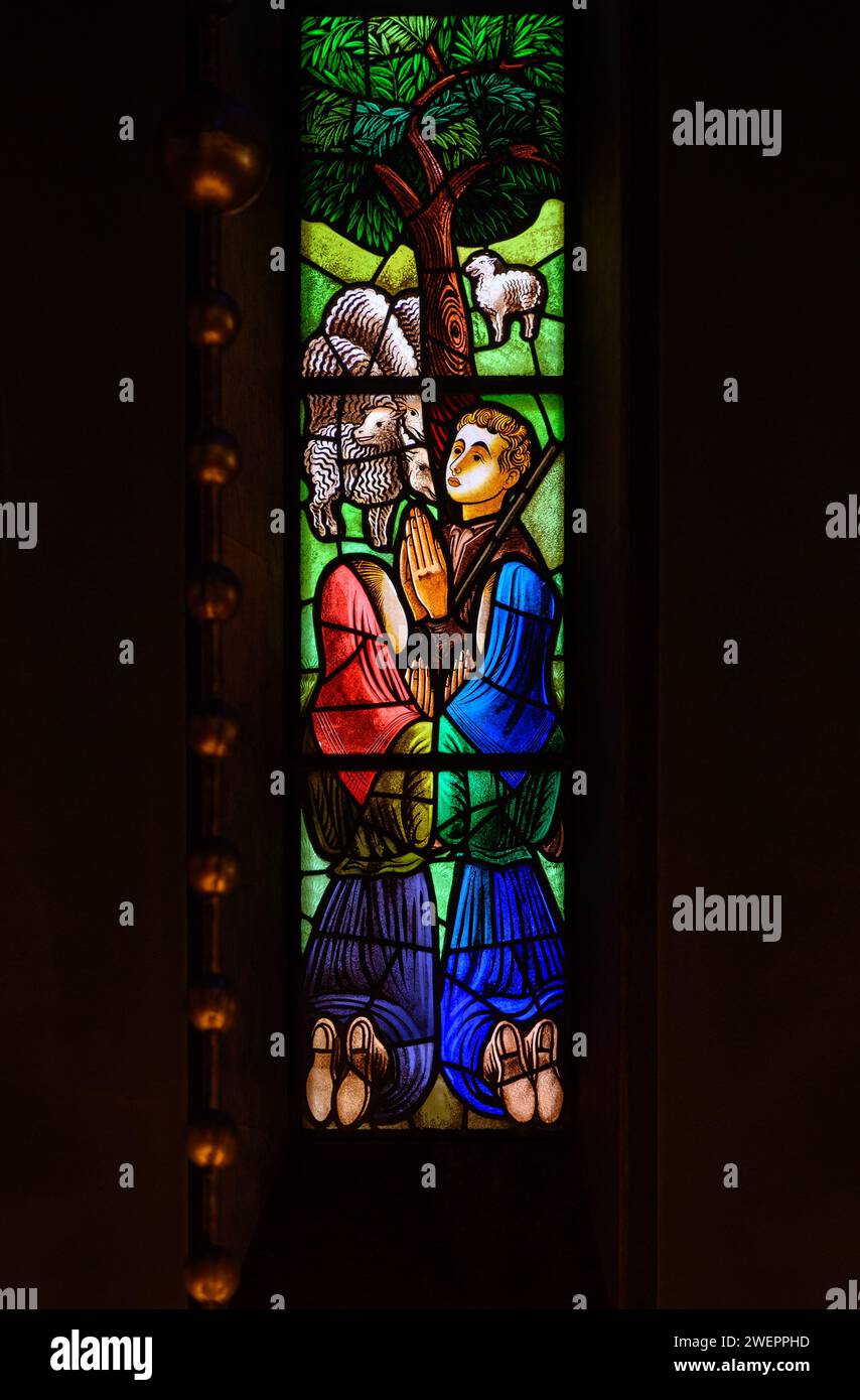 The three shepherd children – Lúcia, Jacinta and Francisco. A part of a larger stained-glass window in Igreja de Nossa Senhora de Fátima, Lisbon. Stock Photo
